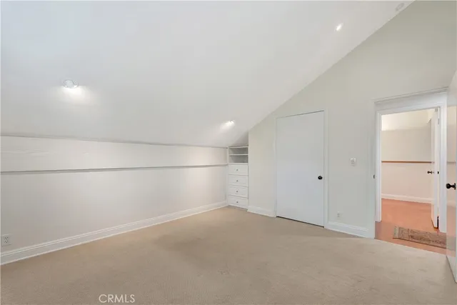 an aerial view of a house with a ocean view