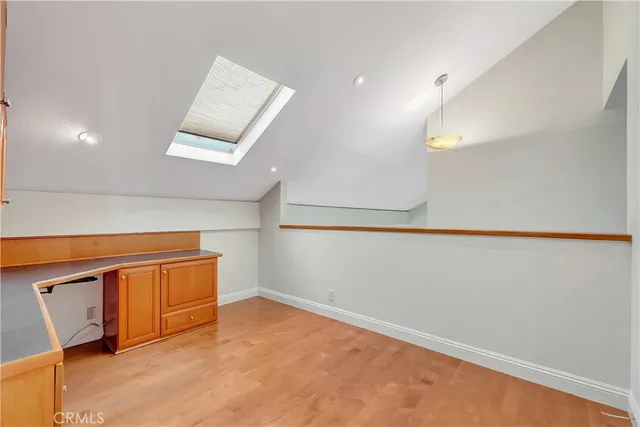 a aerial view of a house with swimming pool and outdoor seating