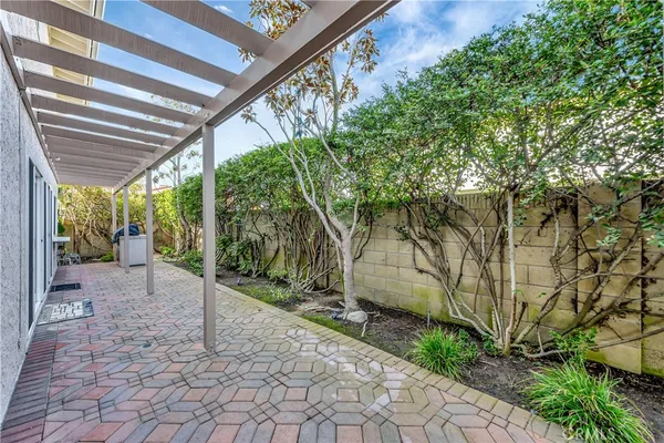 an aerial view of a house with a garden