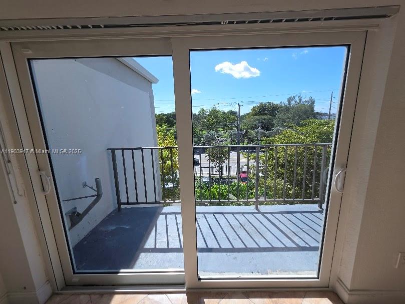 5505 Northwest 7th Street, Unit W401 Miami, FL 33126 - Photo 11 of 11 a view of a porch