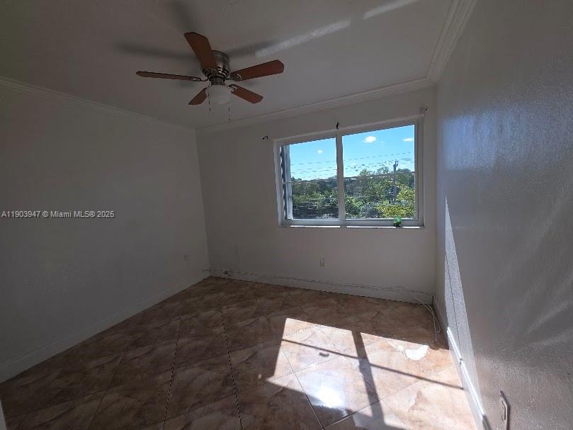 5505 Northwest 7th Street, Unit W401 Miami, FL 33126 - Photo 8 of 11 an empty room with a window