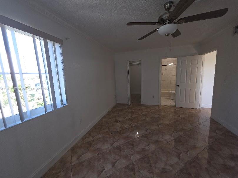 5505 Northwest 7th Street, Unit W401 Miami, FL 33126 - Photo 10 of 11 a view of an empty room and a window
