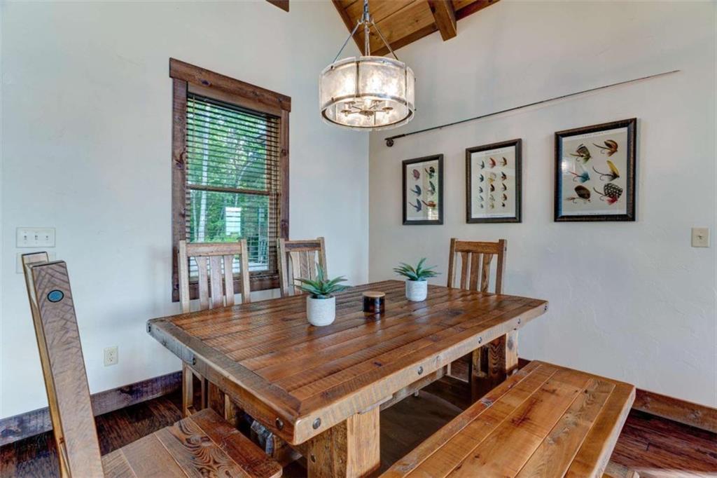 370 High Ridge Road Epworth, GA 30541 - Photo 12 of 42 a view of a dining room with furniture window and wooden floor
