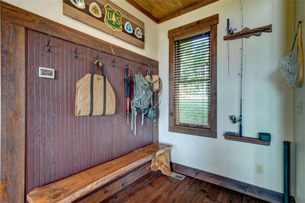 370 High Ridge Road Epworth, GA 30541 - Photo 14 of 42 a view of a door and chair in a room