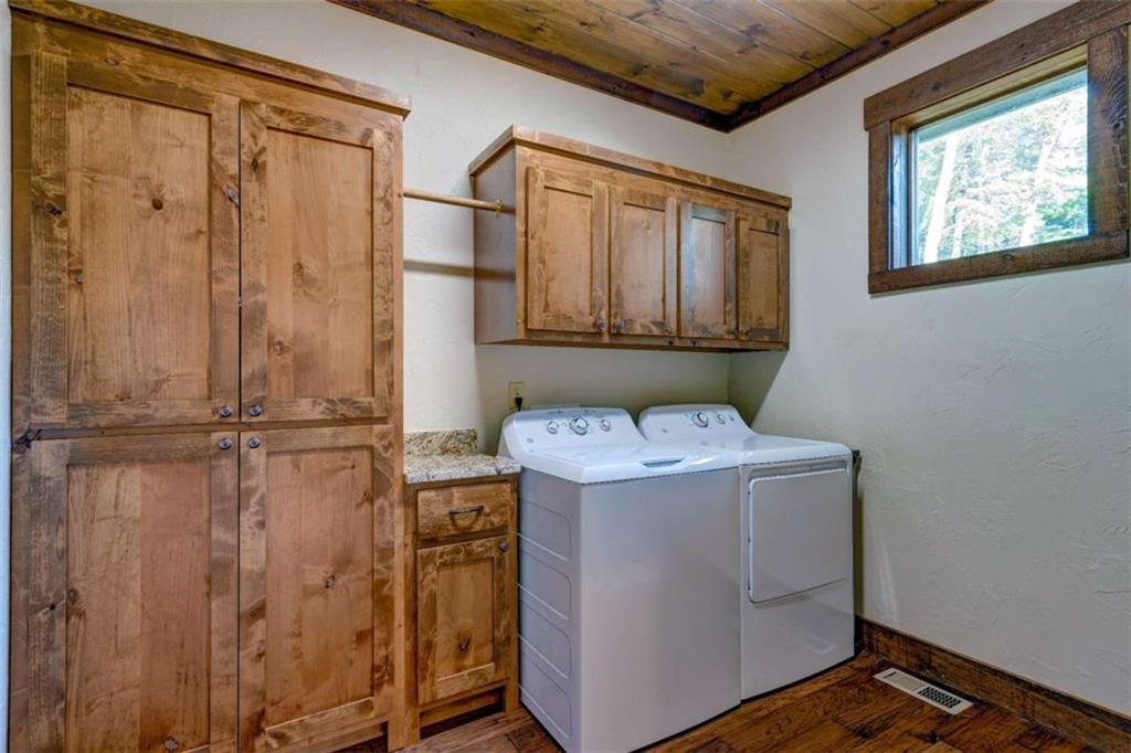 370 High Ridge Road Epworth, GA 30541 - Photo 15 of 42 a utility room with closet dryer and washer