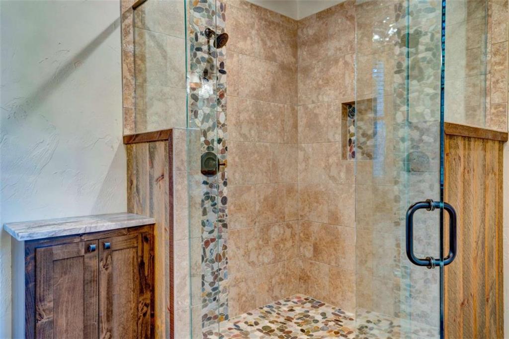 370 High Ridge Road Epworth, GA 30541 - Photo 28 of 42 a bathroom with a shower