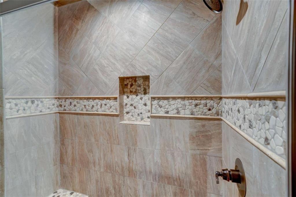 370 High Ridge Road Epworth, GA 30541 - Photo 30 of 42 a close view of a shower in a bathroom