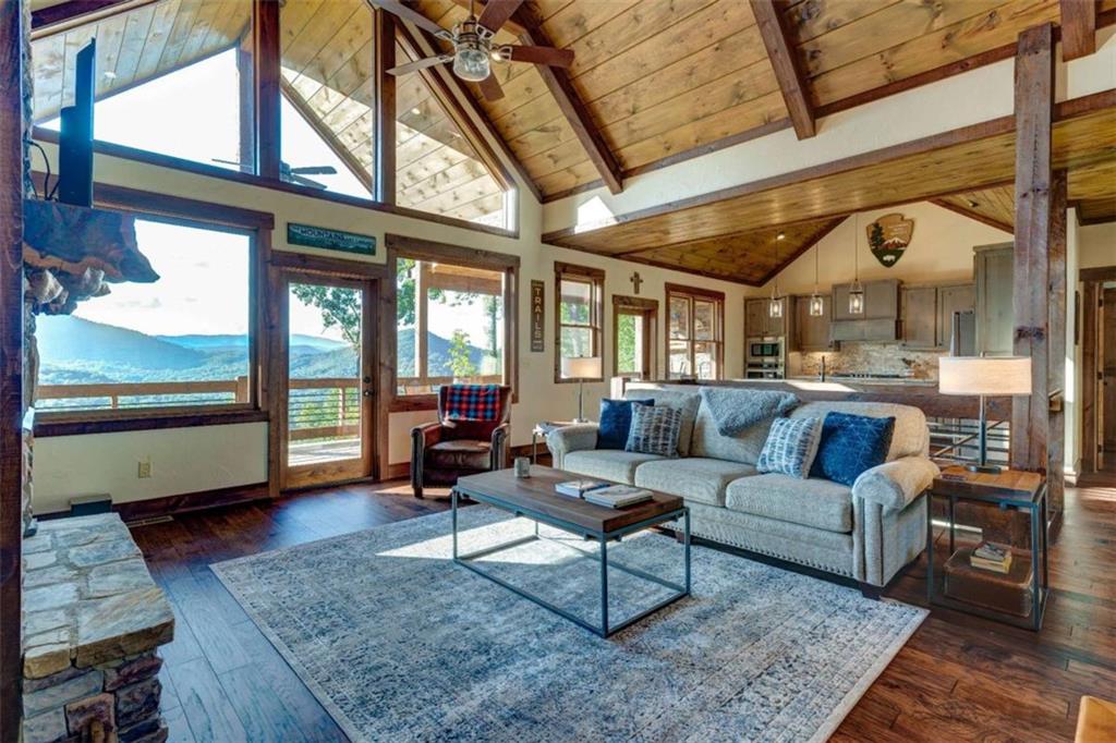 370 High Ridge Road Epworth, GA 30541 - Photo 3 of 42 a living room with furniture and a large window