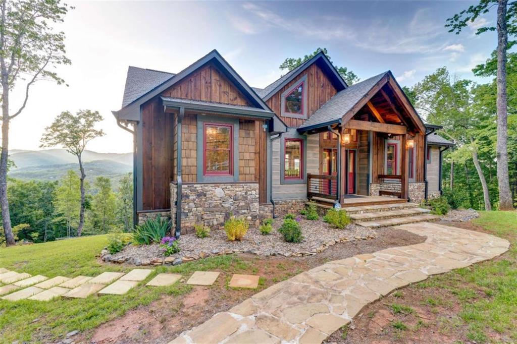 370 High Ridge Road Epworth, GA 30541 - Photo 36 of 42 a front view of a house with garden