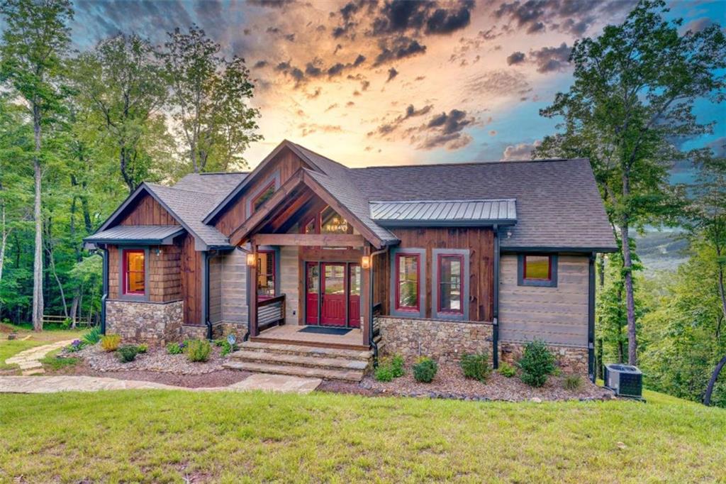 370 High Ridge Road Epworth, GA 30541 - Photo 38 of 42 a front view of a house with garden