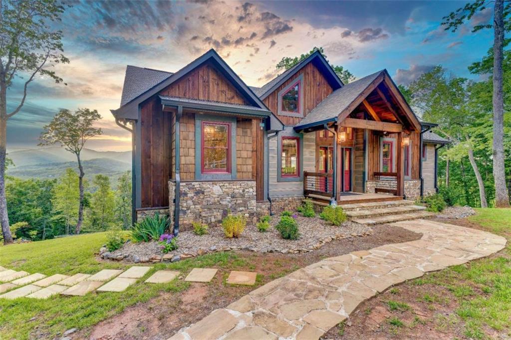 370 High Ridge Road Epworth, GA 30541 - Photo 39 of 42 a front view of a house with garden