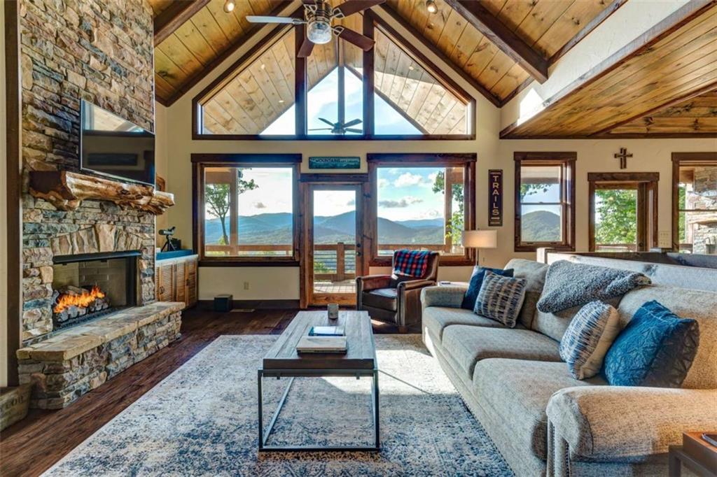 370 High Ridge Road Epworth, GA 30541 - Photo 4 of 42 a living room with furniture and a fireplace