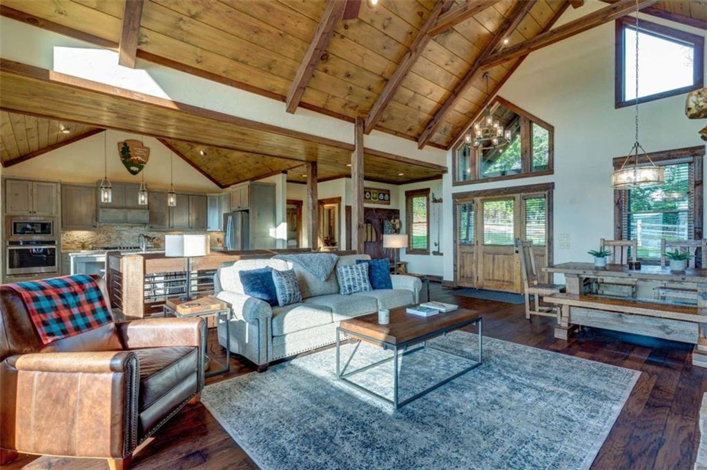 370 High Ridge Road Epworth, GA 30541 - Photo 7 of 42 a living room with furniture and a rug