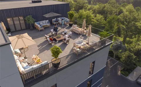 an aerial view of a house with a garden