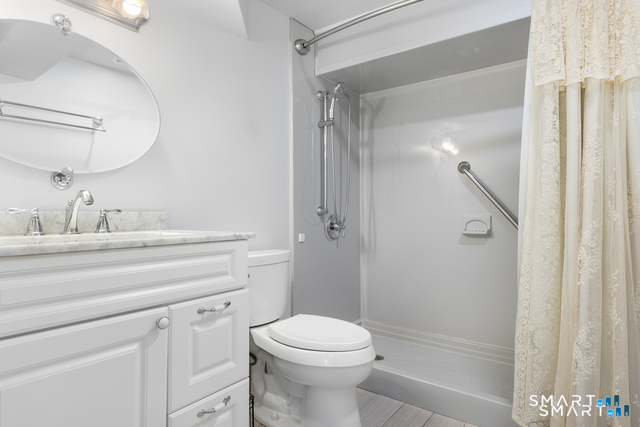 62 Chatham Road Berlin, CT 06037 - Photo 32 of 38 a bathroom with a toilet sink and shower