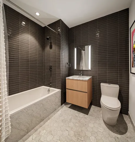 a bathroom with a toilet and a sink