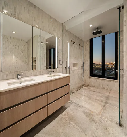 a bathroom with a toilet a sink and bathtub
