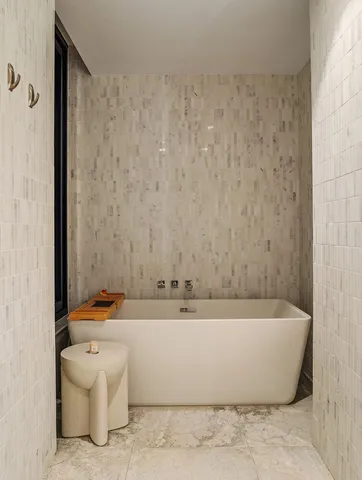 a bathroom with a double vanity sink mirror and double
