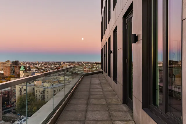 a bathroom with a double vanity sink toilet and shower