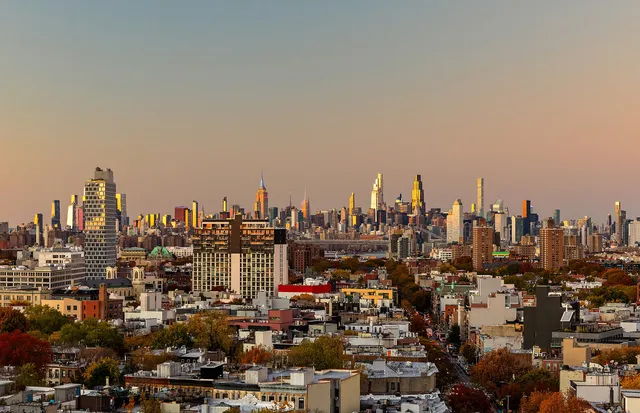 a view of a city with tall buildings