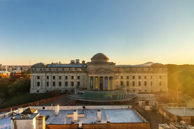 a view of a city with tall buildings