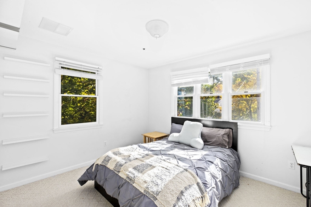 22 Beach Road Sharon, MA 02067 - Photo 16 of 27 a bedroom with a bed and a window