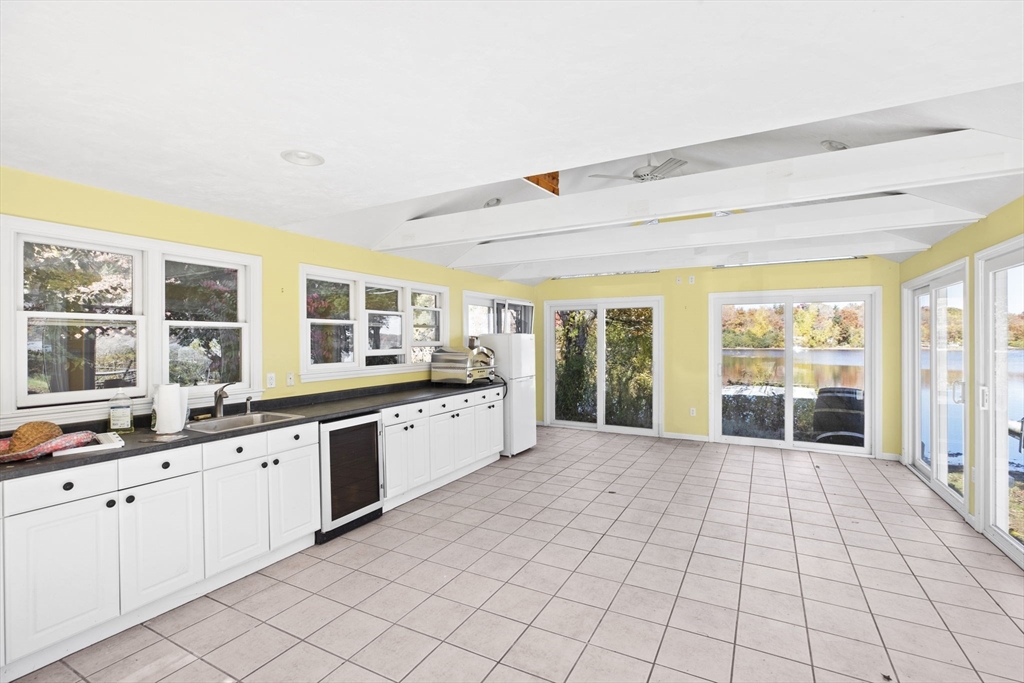 22 Beach Road Sharon, MA 02067 - Photo 18 of 27 a large white kitchen with a large window