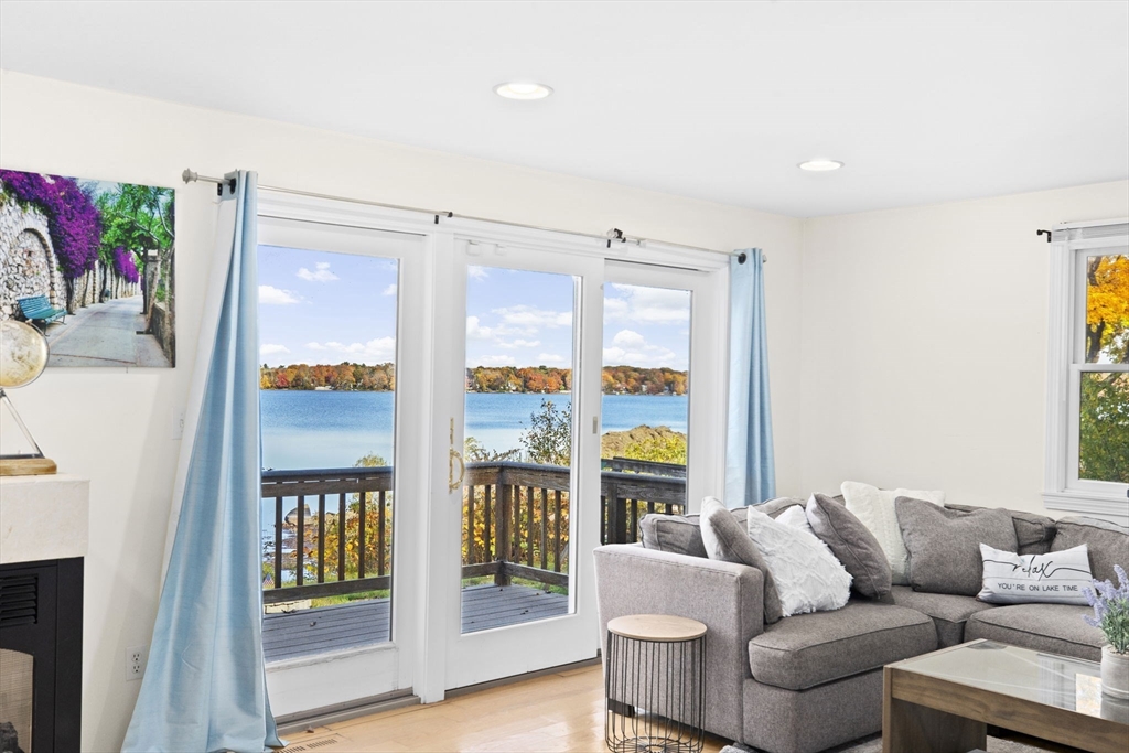 22 Beach Road Sharon, MA 02067 - Photo 6 of 27 a living room with furniture and a window