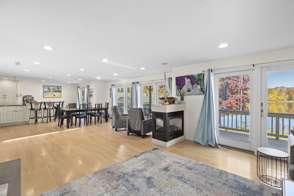 22 Beach Road Sharon, MA 02067 - Photo 7 of 27 a living room with lots of furniture and lots of furniture
