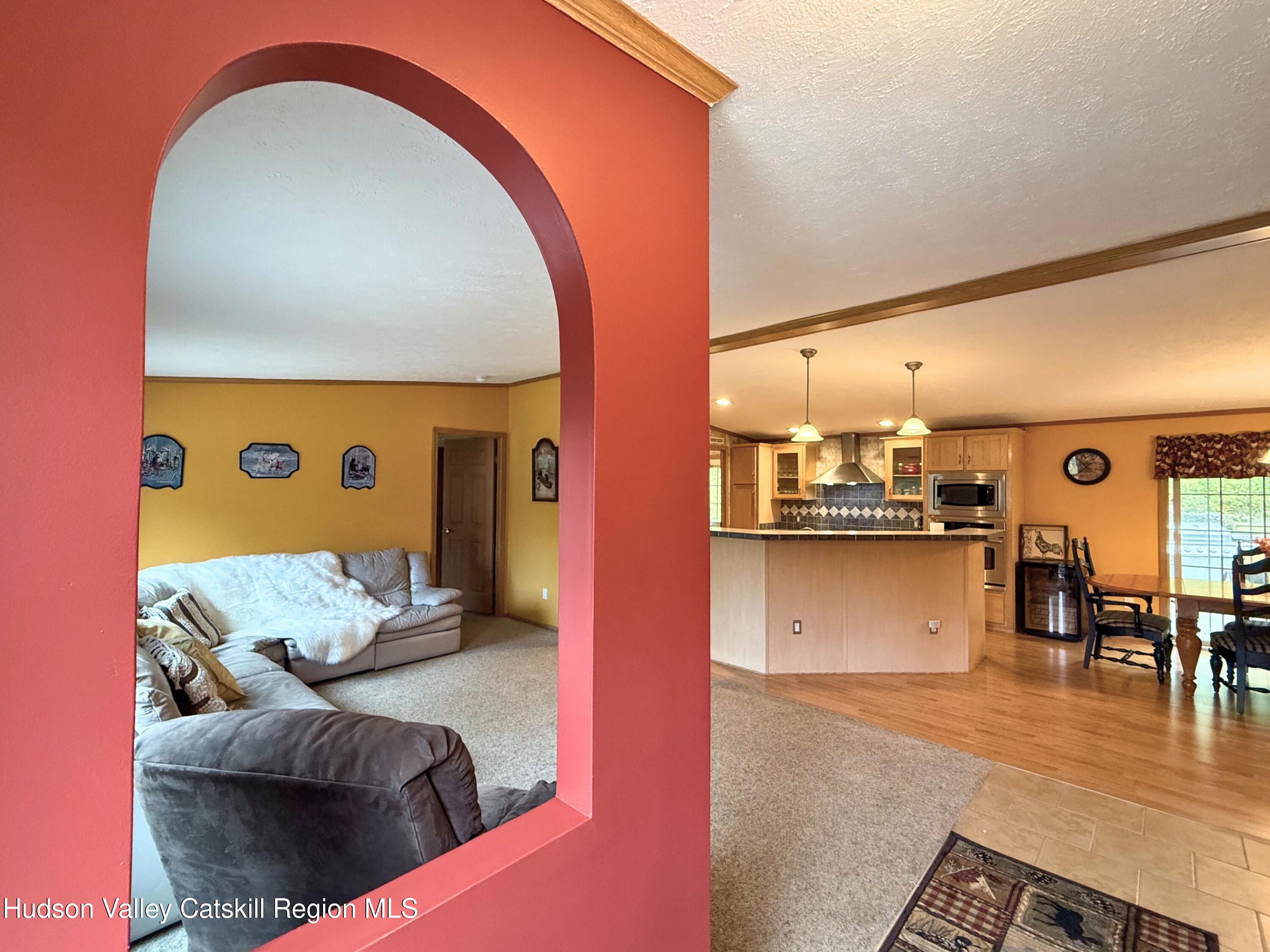 766 Hog Mountain Circle Fleischmanns, NY 12430 - Photo 8 of 31 a living room with furniture and wooden floor