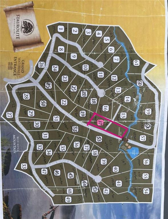 Lot 17 Staurolite Mountain Drive Blue Ridge, GA 30513 - Photo 2 of 3 a view of a wall with a wall