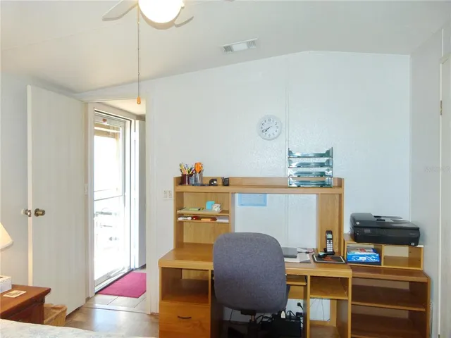 a room with furniture and a chandelier