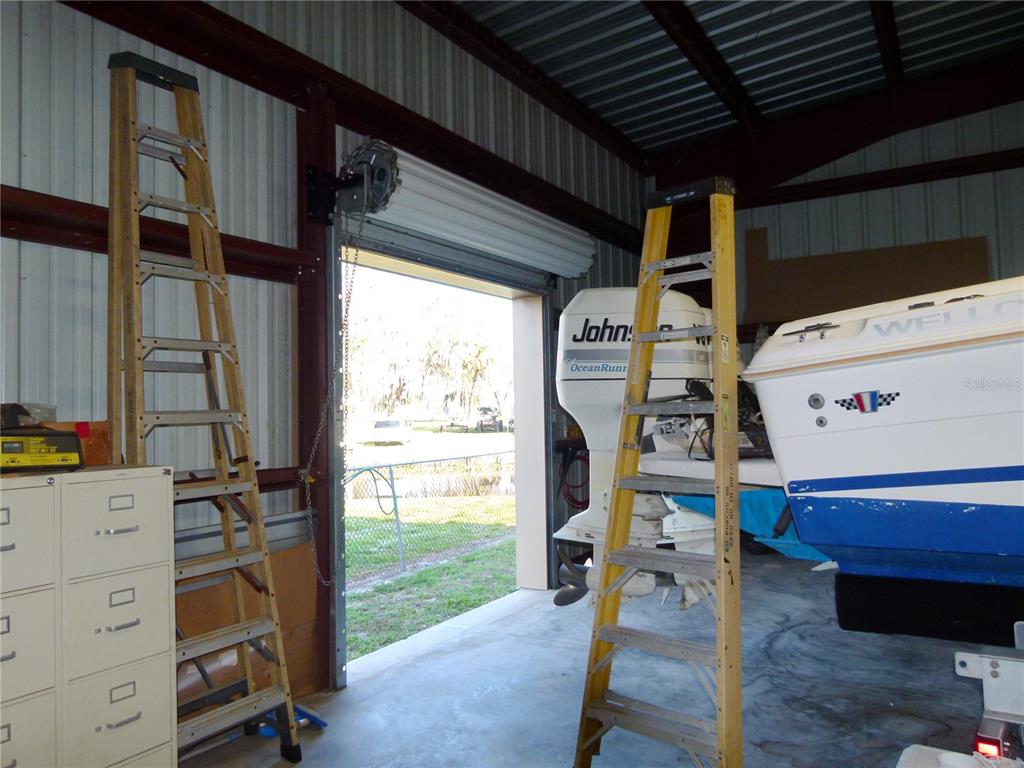 1017 1st Street Okeechobee, FL 34974 - Photo 34 of 36 a view of a room with gym equipment
