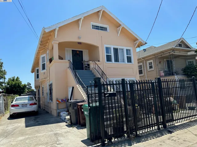 a front view of a house with parking