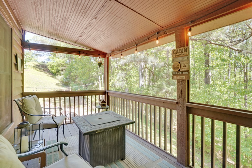 41 Courtside Court Ellijay, GA 30540 - Photo 19 of 34 a view of a chairs in balcony