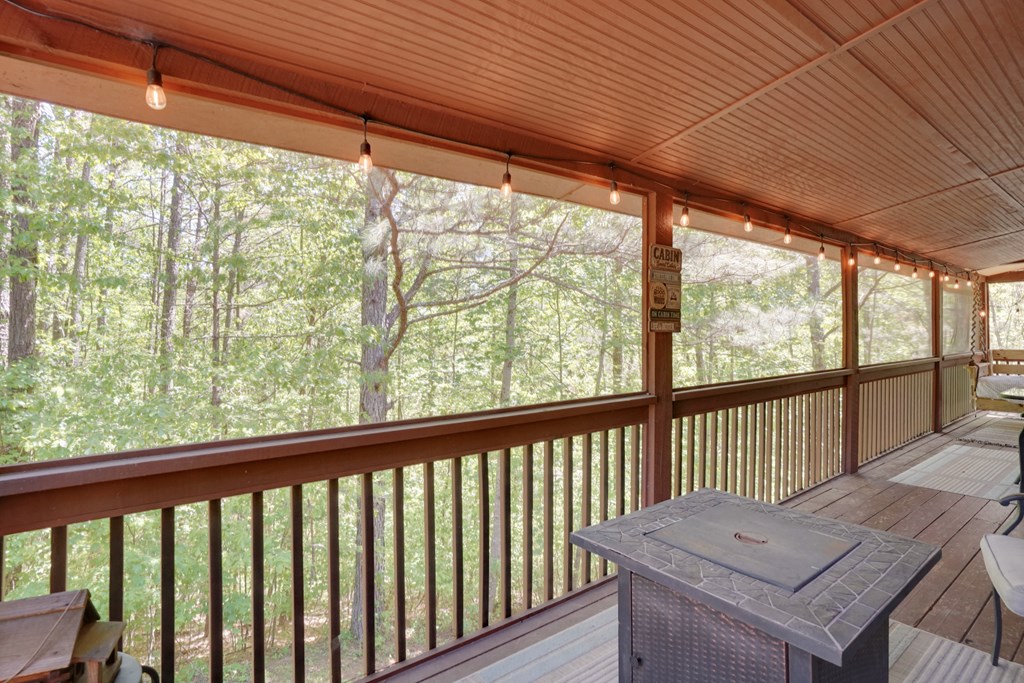 41 Courtside Court Ellijay, GA 30540 - Photo 20 of 34 a view of a balcony with wooden floor