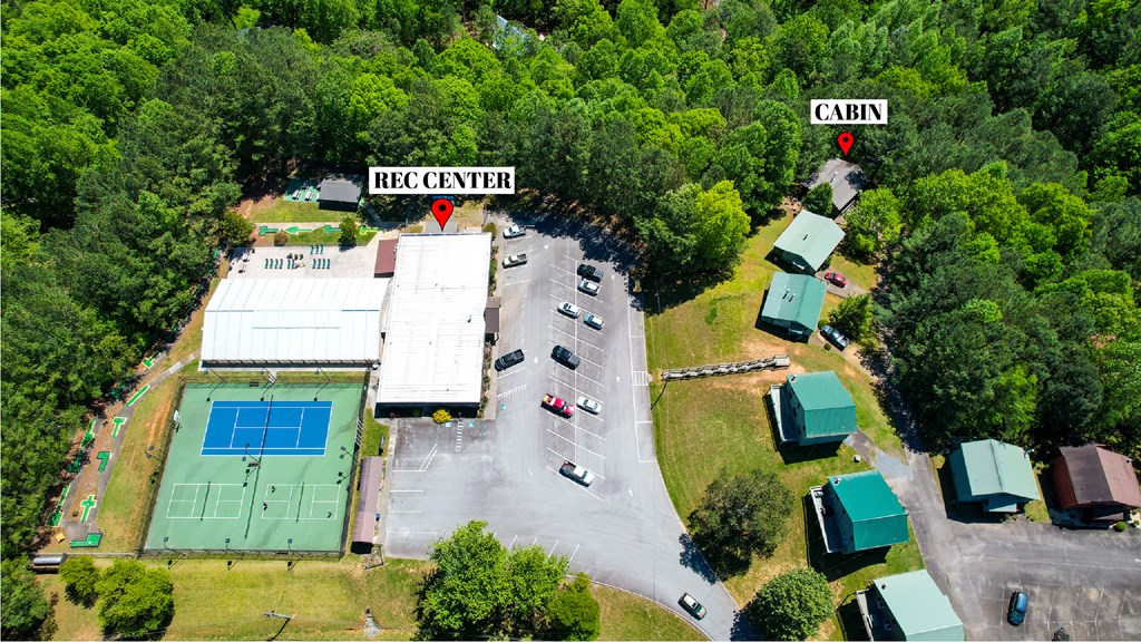 41 Courtside Court Ellijay, GA 30540 - Photo 2 of 34 an aerial view of a house with swimming pool