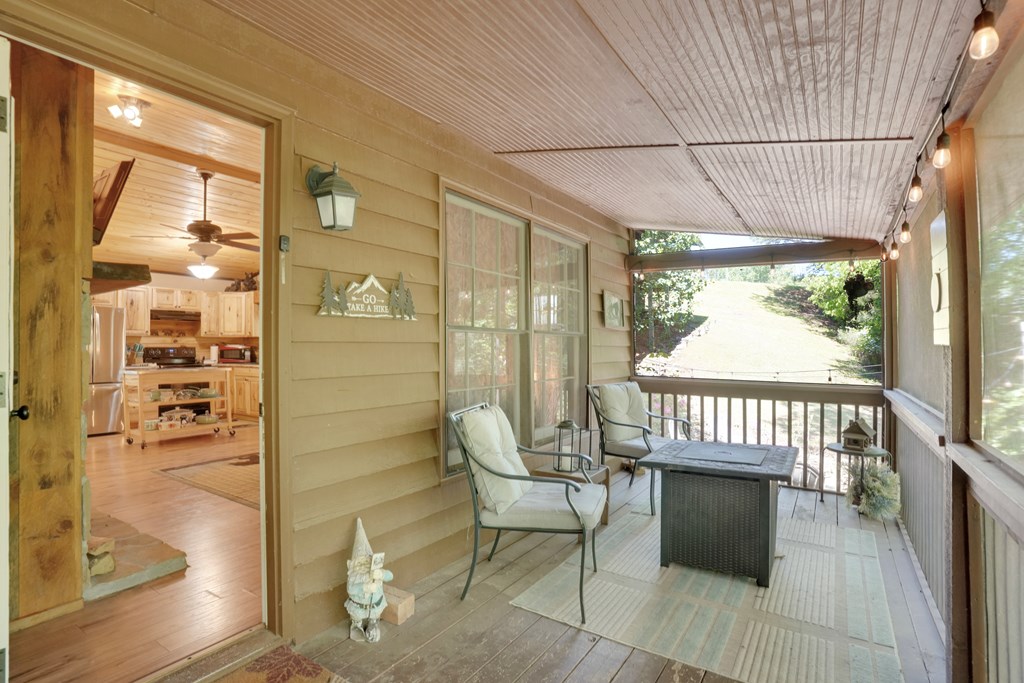 41 Courtside Court Ellijay, GA 30540 - Photo 22 of 34 a view of a balcony with furniture