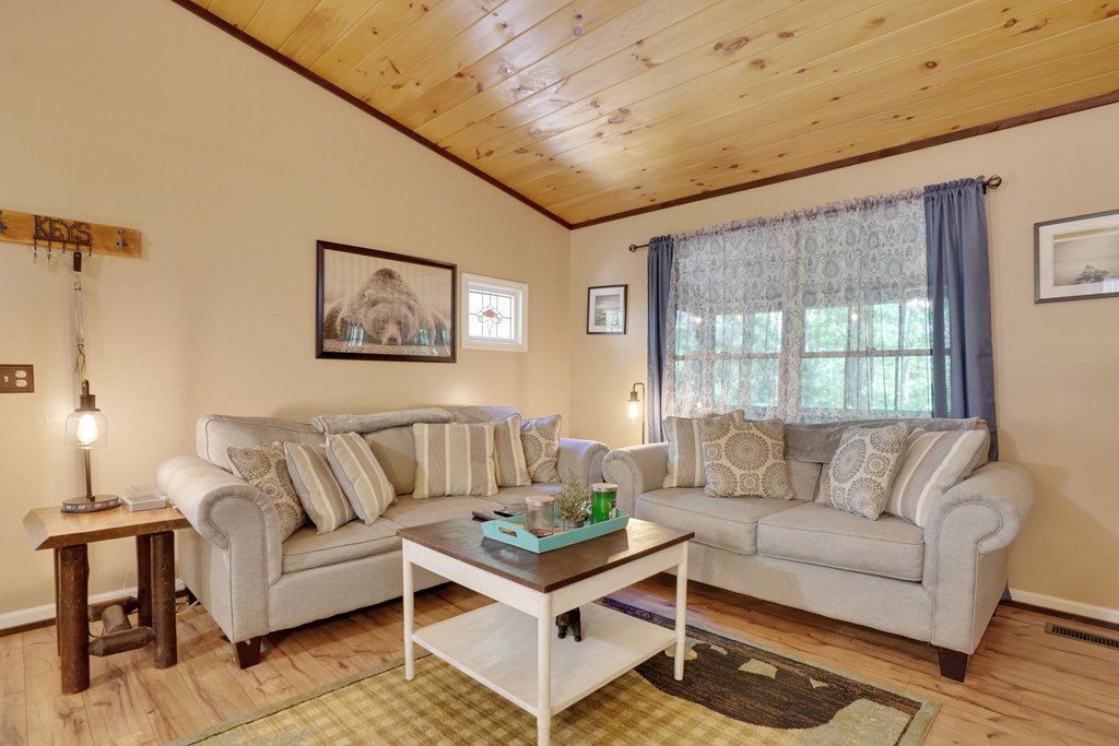 41 Courtside Court Ellijay, GA 30540 - Photo 27 of 34 a living room with furniture and a large window