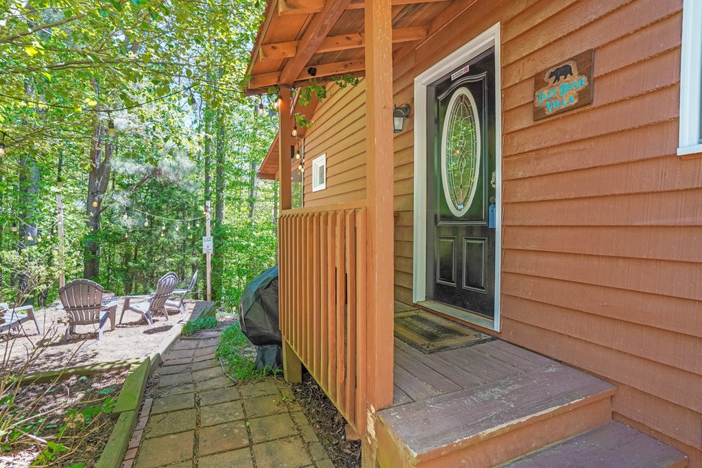 41 Courtside Court Ellijay, GA 30540 - Photo 28 of 34 a view of a door and chair in the balcony