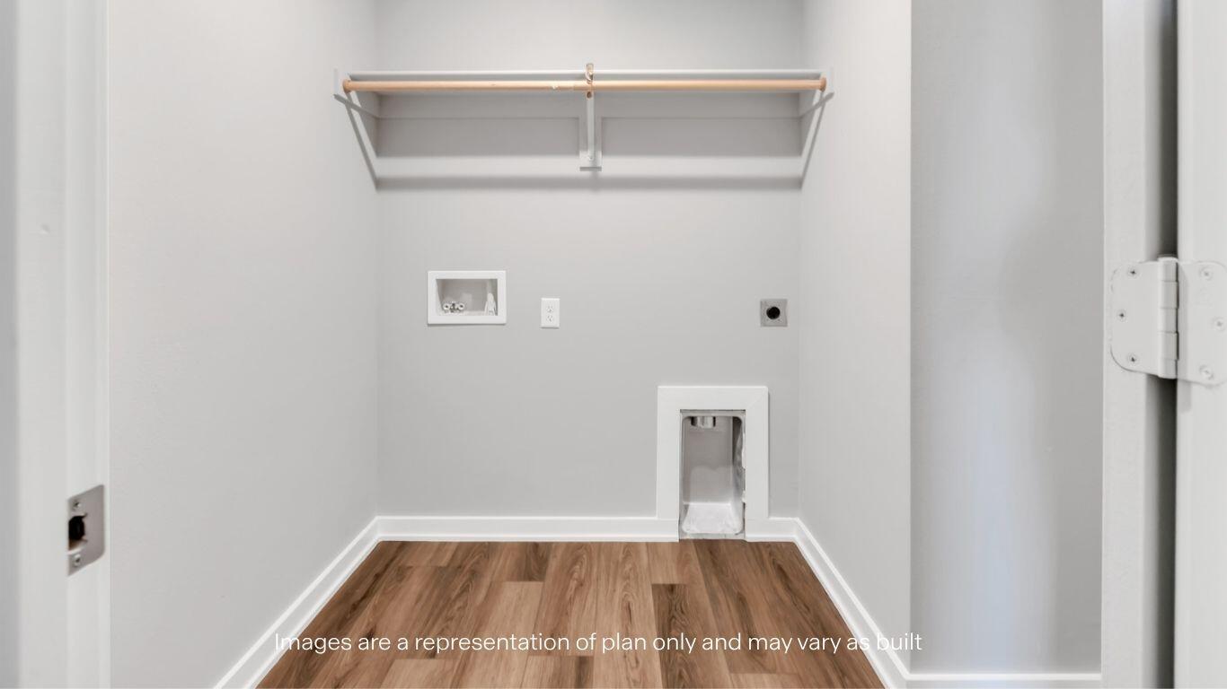 224 18th Street Wolfforth, TX 79382 - Photo 11 of 27 a view of a room with wooden floor and window