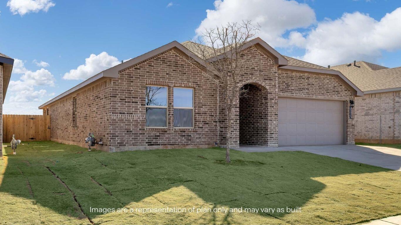 224 18th Street Wolfforth, TX 79382 - Photo 2 of 27 a front view of a house with a yard