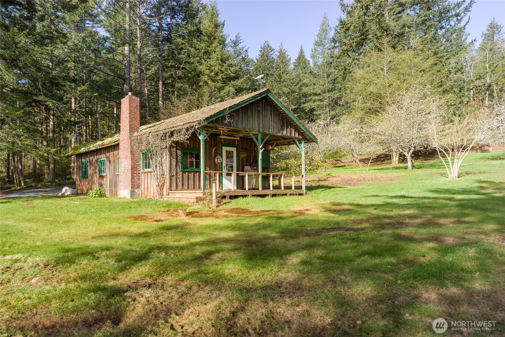 557 Old Sentinel Road Orcas Island, WA 98279 - Photo 27 of 40 a front view of a house with a yard