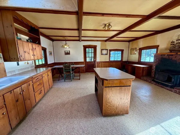 a bedroom with bed and window