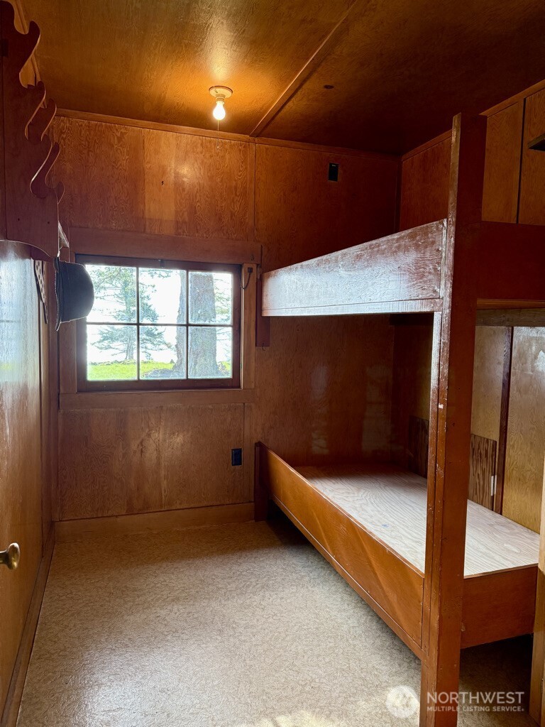 557 Old Sentinel Road Orcas Island, WA 98279 - Photo 40 of 40 a bedroom with bed and window