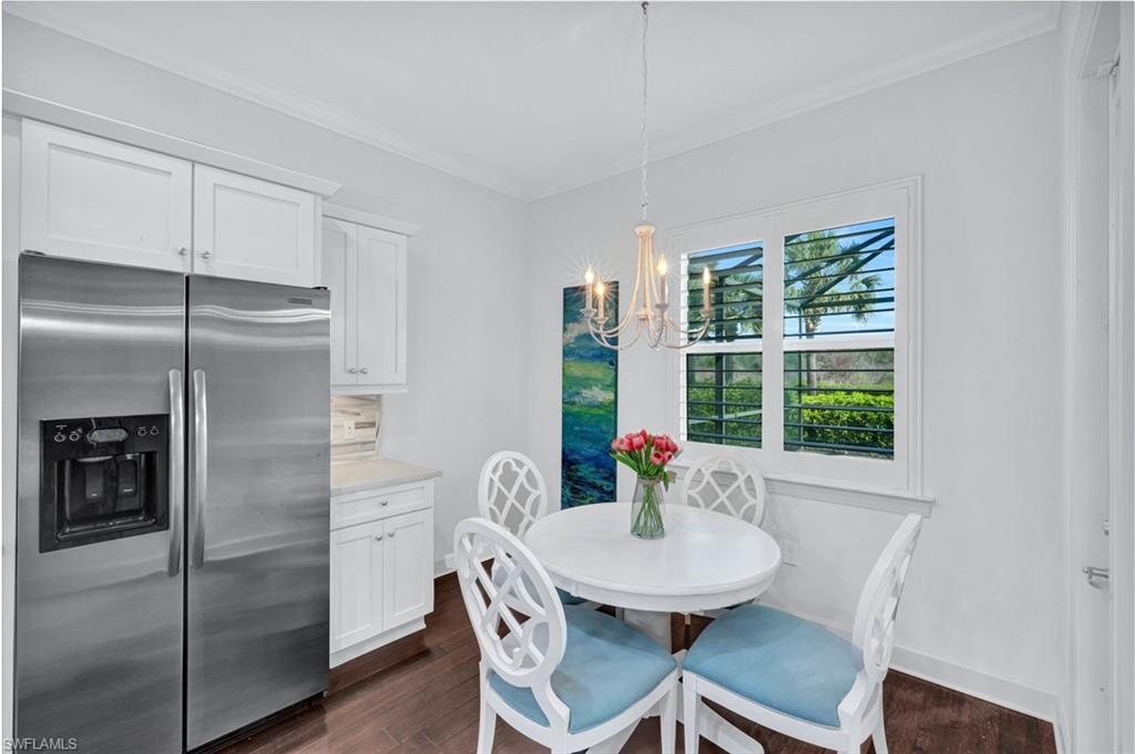 9311 Fieldstone Lane Naples, FL 34120 - Photo 13 of 48 a view of a dining room with furniture window and outside view