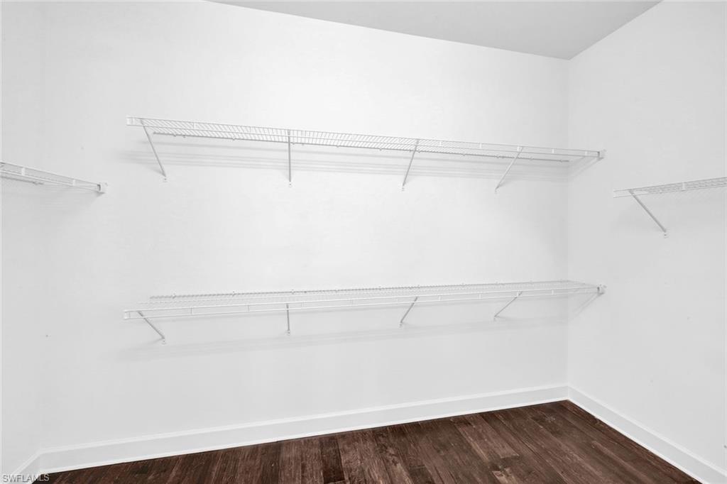 9311 Fieldstone Lane Naples, FL 34120 - Photo 21 of 48 a view of a room with racks on the wall