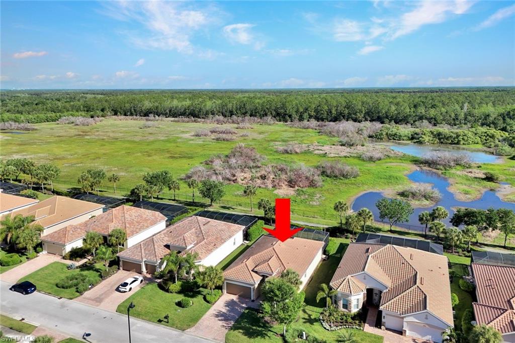 9311 Fieldstone Lane Naples, FL 34120 - Photo 36 of 48 an aerial view of a city