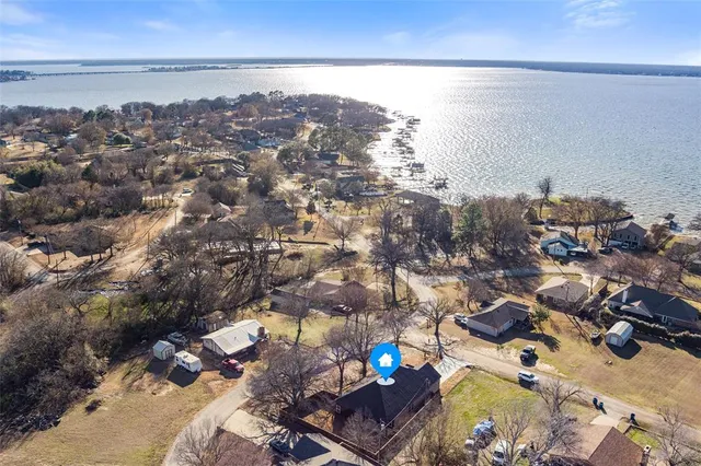 an aerial view of a city with ocean view