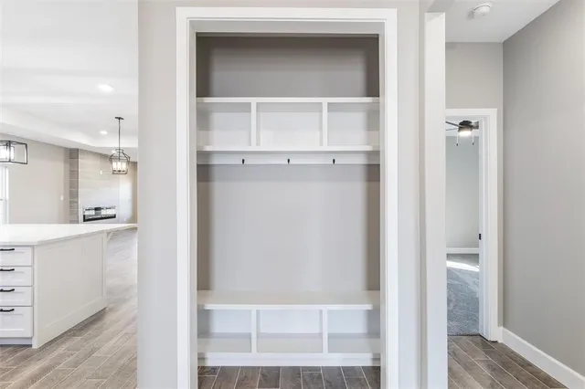 a view of a walk in closet and bedroom